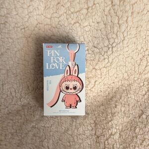Adorable labubu Keychain by Pop mart pin for love.